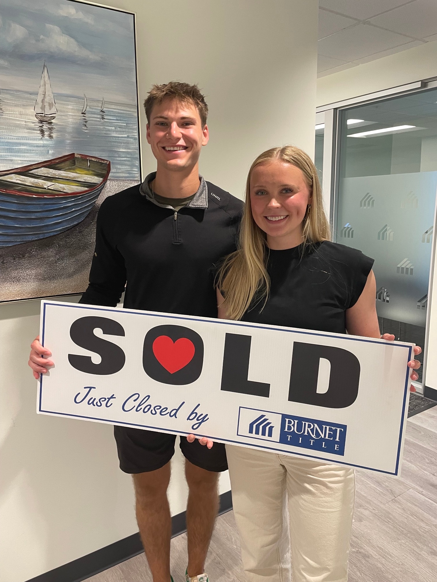 Couple touring a home with a real estate agent