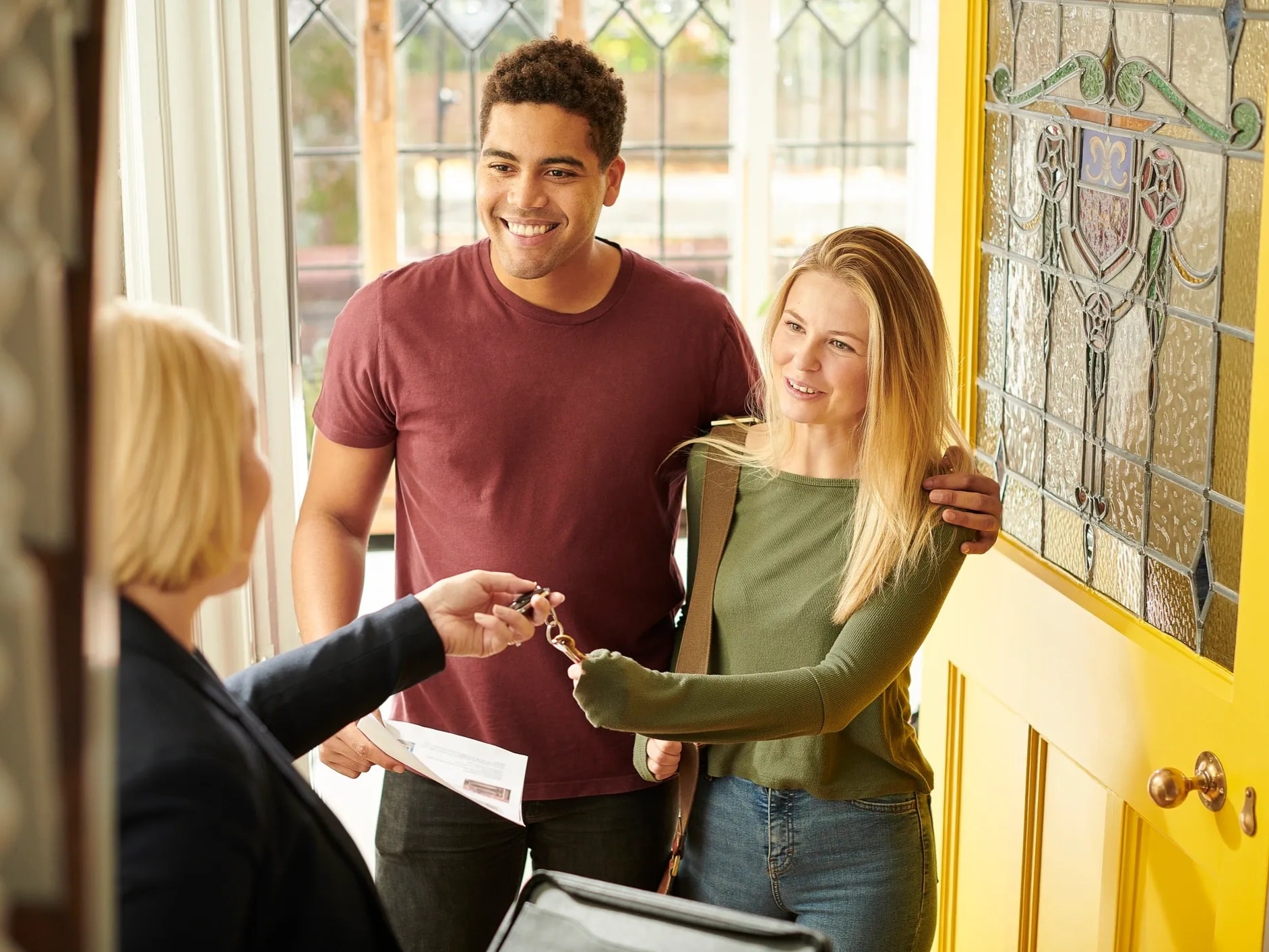 Landlord handing keys to tenant